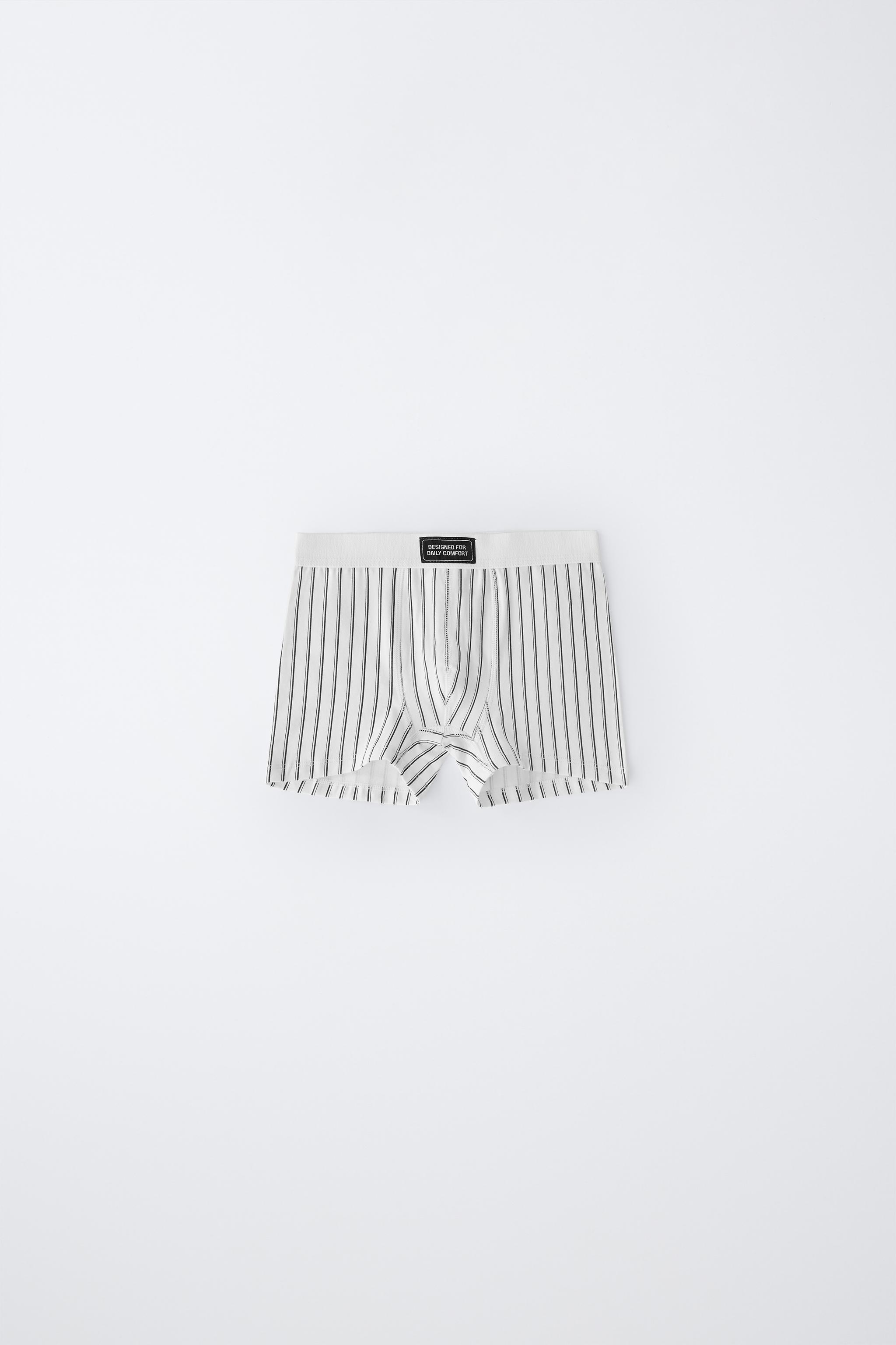 PACK DE CINQ BOXERS ÉTIQUETTE (6-14 ANS)